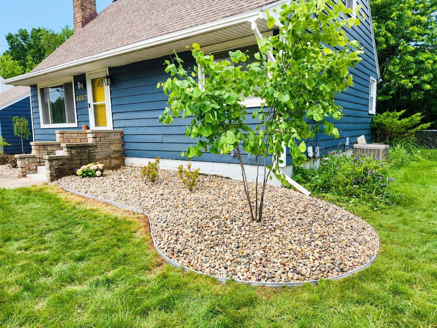 Rock border landscape bed install, Grand Rapids MI